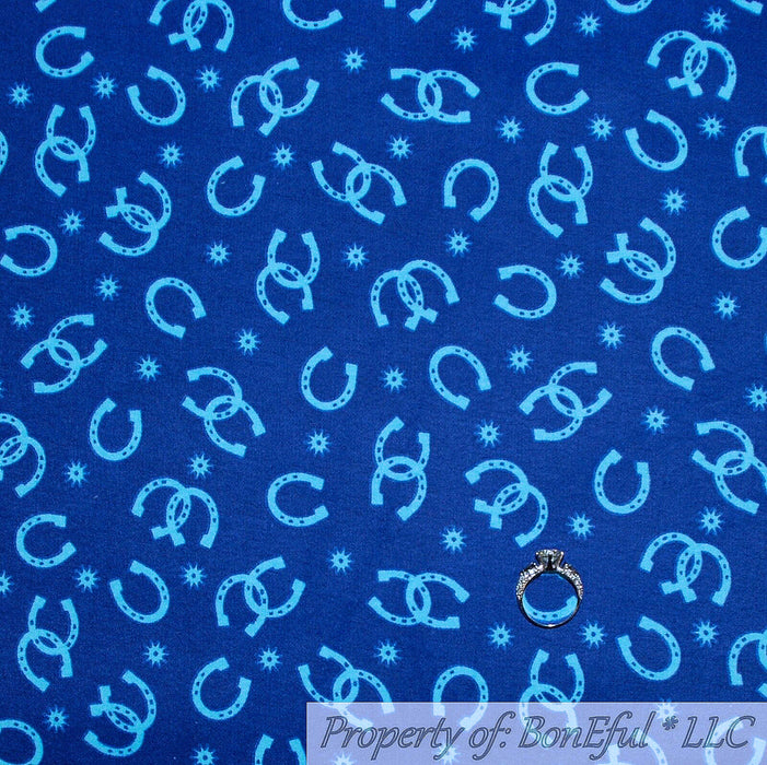 Flannel Fabric BTY Navy Blue Bright Teal Horse Shoe Star